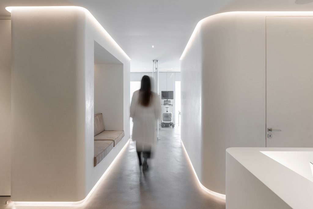 minimal office medical practice corridor total white and grey