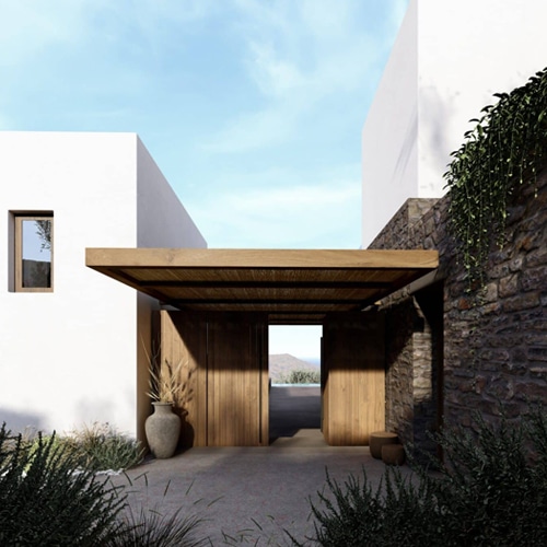 vacation houses in tinos with stone and wood details