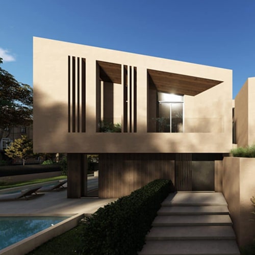 a villa in karditsa in beige tones with a prismatic roof