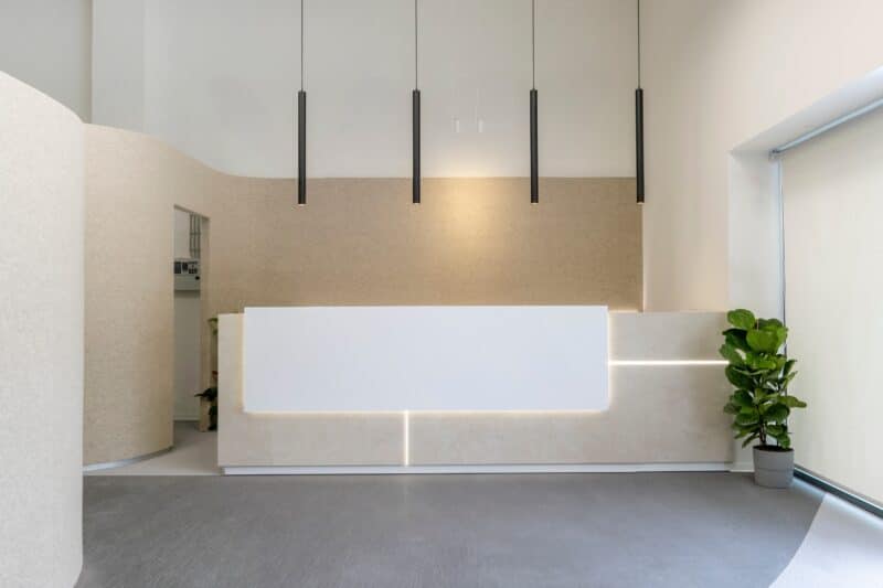 insurance company reception minimal design wood