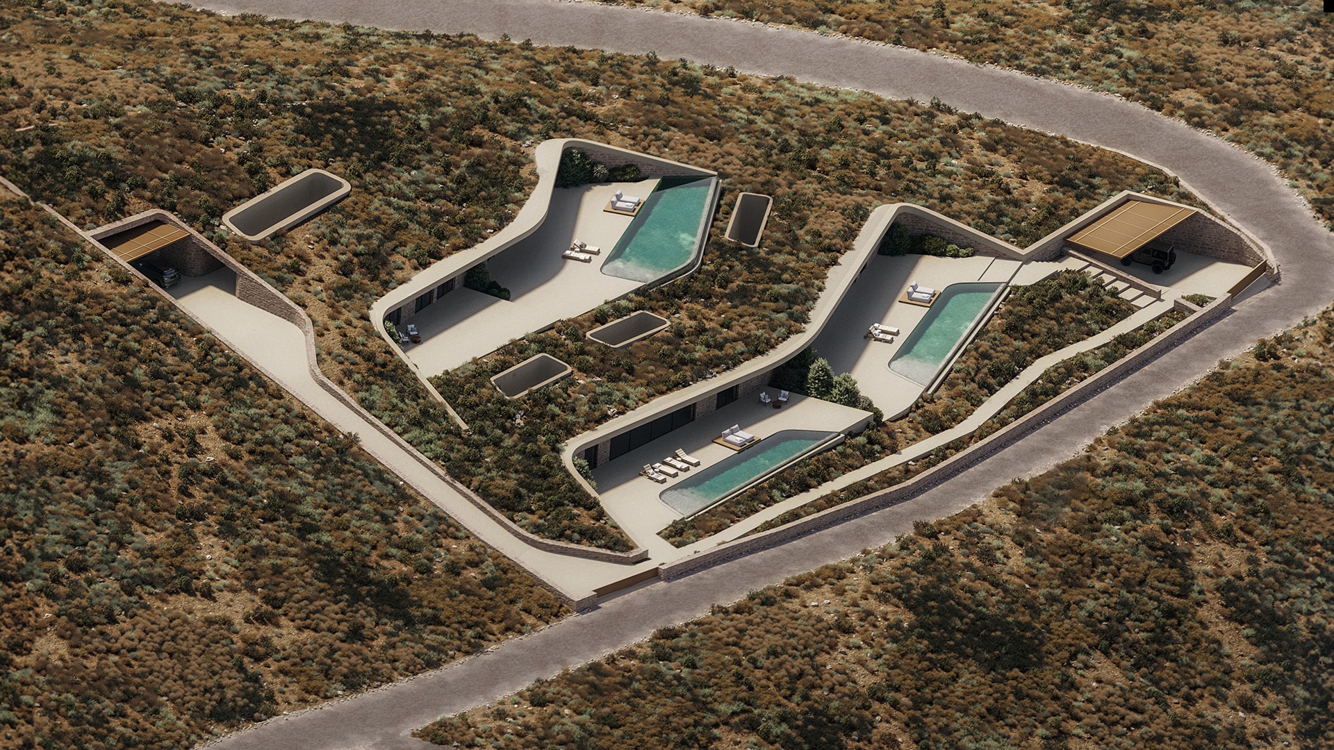 a top-view photograph of a semi-subterranean house in Kea island